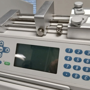 Syringe pump with keypad and display – lab instrument prop