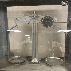 Antique analytical beam balance in a glass case – period lab prop