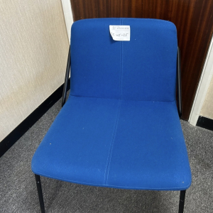 Blue upholstered chair – set dressing