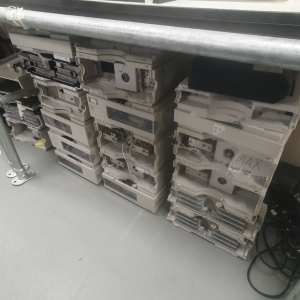 Racks of HPLC modules in storage – laboratory equipment props