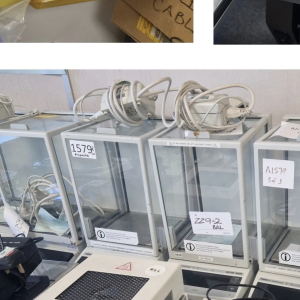 Row of small benchtop incubators with glass doors – laboratory props