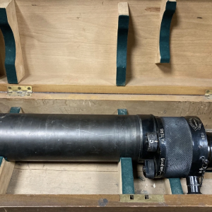 Antique brass optical lens in a wooden case – period scientific prop