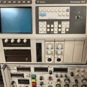 Vintage electronic instrument rack with buttons and gauges – 1980s lab prop