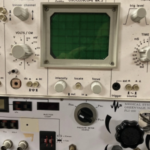 Vintage oscilloscope with green screen – retro scientific prop