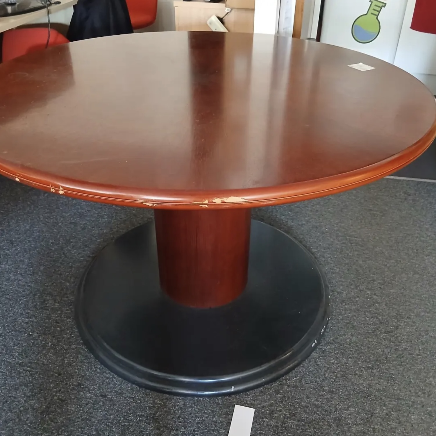 Round red wooden laboratory table – set dressing prop